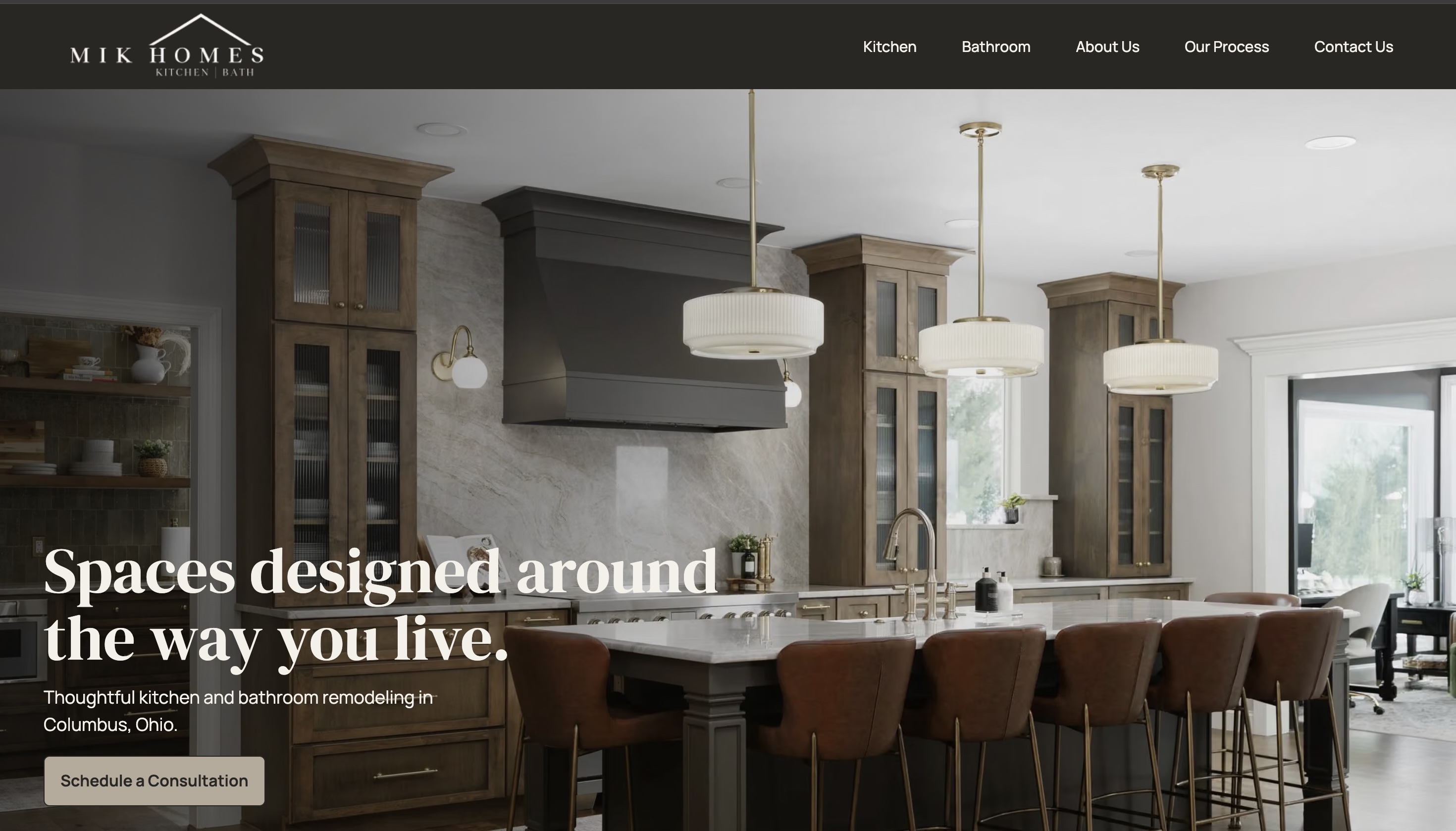 MIK Homes redesigned homepage featuring a finished kitchen, concise messaging, and a consultation call to action