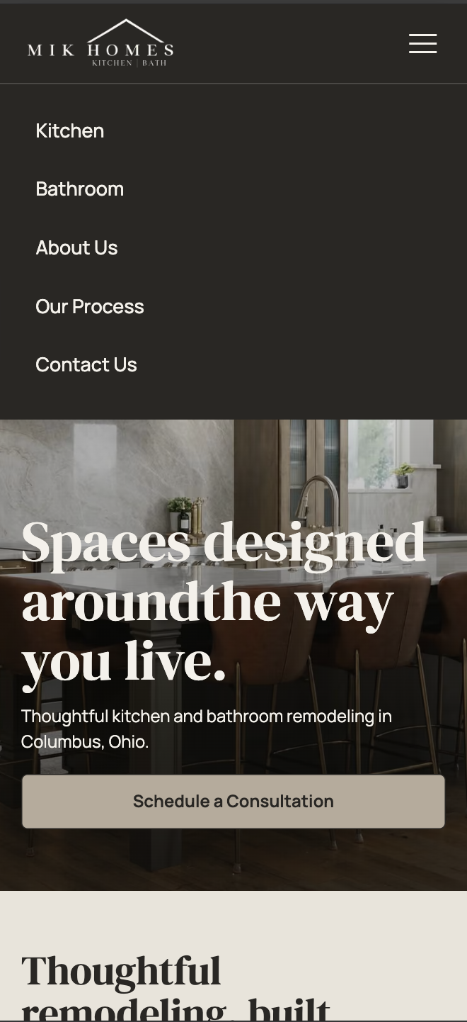 Verified mobile implementation showing the MIK Homes navigation menu and homepage hero